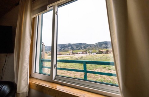 Centennial Apartment | Queen Suite in Historic Centennial Hotel