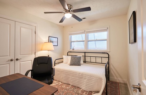Ogden House | Quiet home with sunroom, modern amenities, fenced in yard, EV Charging, & more!