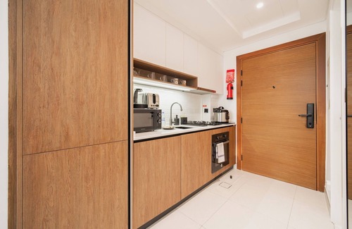 Dubai Apartment | Quiet Top-Floor Studio Near Metro + Baby Gear