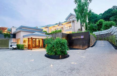Sidhpur Hotel | Radisson Blu Resort Dharamshala
