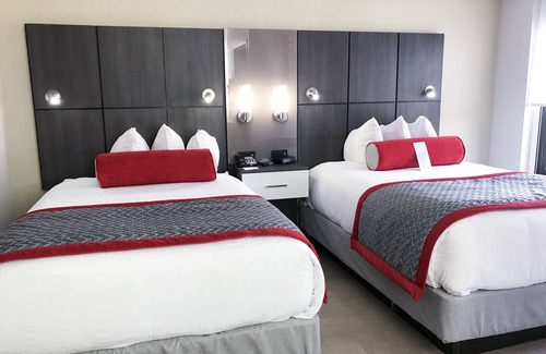 Airport North Hotel | Ramada by Wyndham Suites Orlando Airport