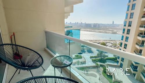 Dubai Production City Apartment | Rare Holiday Homes - Near City Center Ma'eisem - Pool view - Crescent Tower A - R706 - IMPZ