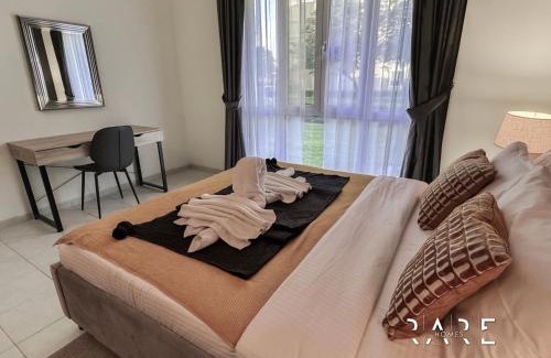 Discovery Gardens Apartment | Rare Holiday Homes - Near Metro - Garden View - Mogul Cluster - Building# 204 - RG09 - Discovery Gardens