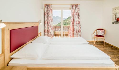 Lagundo Apartment | Rasnerhof Ferienwohnung Talblick