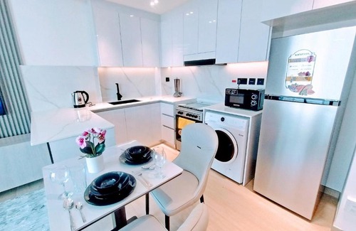 Jumeirah Village Circle Apartment | RBE Vacation Homes-Enjoy Marina View- Binghatti Corner