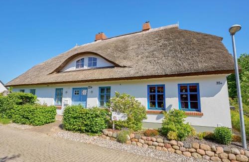 Monchgut-Granitz House | Reethaus Zickersche Berge - WG 02 mit Kamin und Terrasse