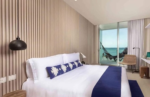 Downtown Cancun Hotel | Refreshing Getaway with Scenic Pool and Beach Access | 1 BR Oceanfront Stay