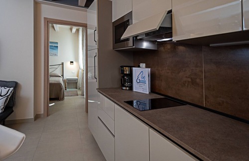 Pacengo Apartment | Regarda - Residenza GJ - G floor modern onebedroom apartment with roof terrace