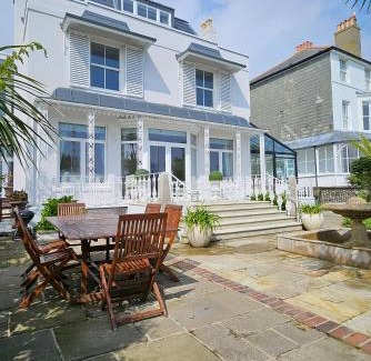 Deal House | Regency Beach House by Bloom Stays