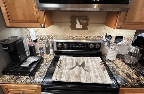 Pocatello Apartment | Relax in a serene patio oasis & a rejuvenating massage chair after a long day!