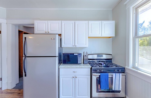 Upper East Side House | Relax in Style: 4BR Milwaukee Home Featuring a Private Hot Tub ¦ Family-Friendly
