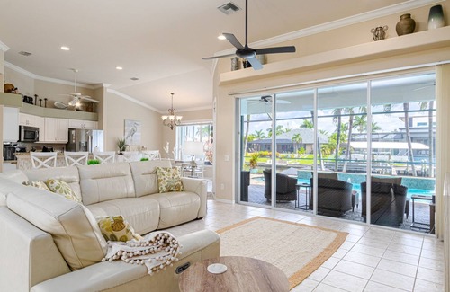 Pelican House | Relax & Unwind: Family Friendly Home with Private Heated Pool and Canal Views!