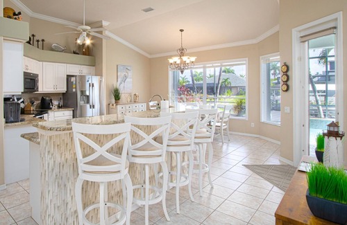 Pelican House | Relax & Unwind: Family Friendly Home with Private Heated Pool and Canal Views!