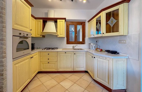 La Pelosa Villa | Relaxation, Comfort, and BBQs Just Steps from the Beach