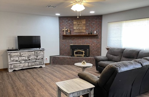 Longtown House | Relaxing Lake Retreat w/firepit, sunroom, patio. Walking distance to water.