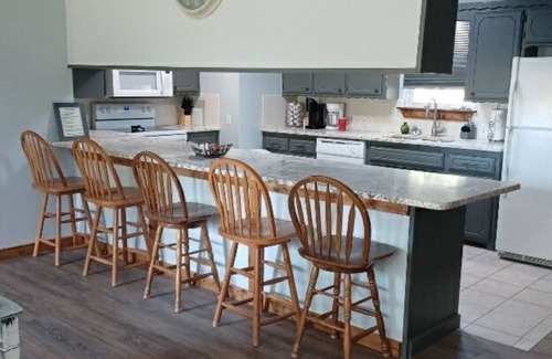 Longtown House | Relaxing Lake Retreat w/firepit, sunroom, patio. Walking distance to water.