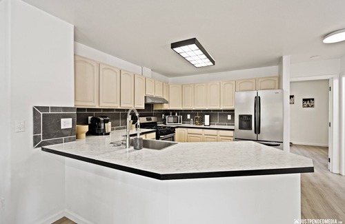 Abbott Loop House | Remodeled central townhouse w/fireplace bike trails & parks