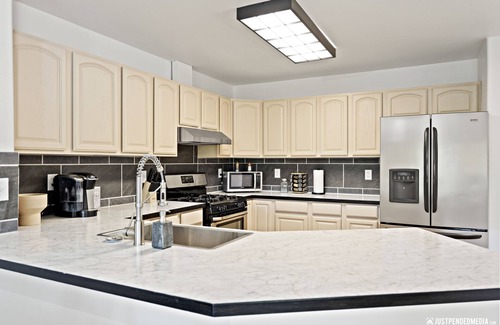 Abbott Loop House | Remodeled central townhouse w/fireplace bike trails & parks