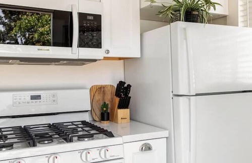 Carlson Park House | Remodeled Designer Cottage with Bicycles