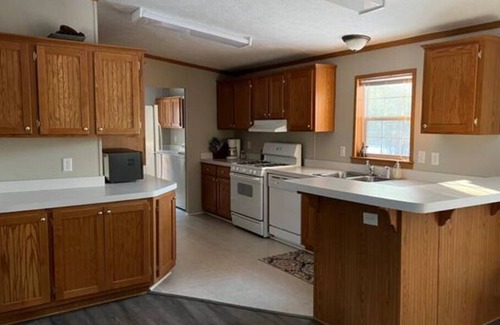 Roscommon House | Remodeled home just minutes from downtown Roscommon and Higgins Lake!
