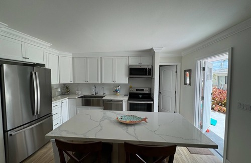 Treasure Cay Villa | Renovated Beach Villa 671. Steps away from the beach. Sleeps 6. WiFi. Laundry
