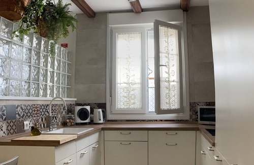 Olvera House | Renovated house with fireplace and terrace