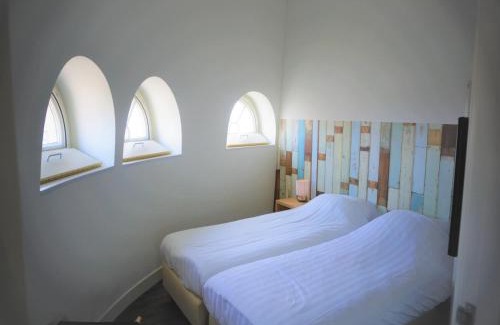 Vlissingen House | Renovated luxury water tower within walking distance of the beach boulevard