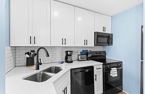 Emerald Coast Apartment | Renovated Studio condo with partial view of beach dunes-Beach Service included
