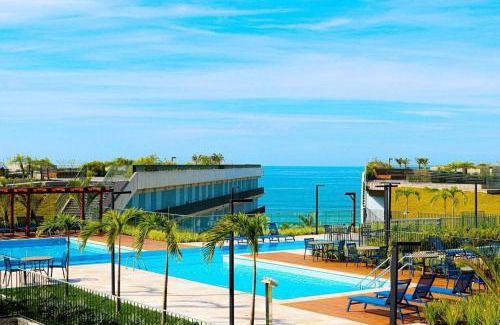 Praia Grande Apartment | Resort frente ao mar apto 1222 DNA Praia Grande