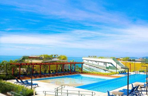 Praia Grande Apartment | Resort frente ao mar apto 1222 DNA Praia Grande