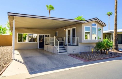 Carriage Manor House | Resort Living in this fully remodeled park home in Carriage Manor