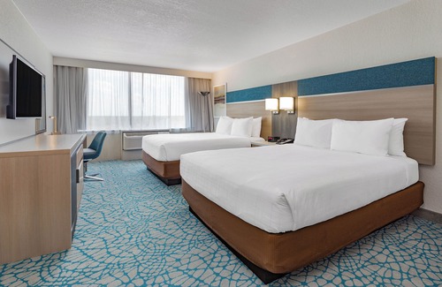 Florida Central Atlantic Coast Hotel | Retreat & Reconnect! Relaxing Room | Onsite Pool