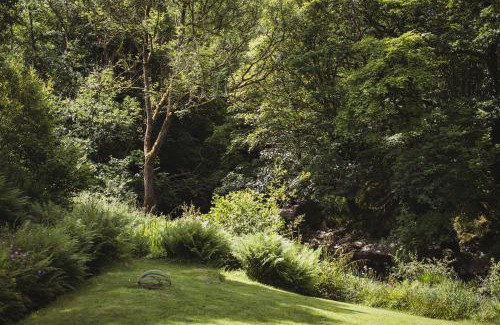 Llanfair Caereinion House | River Cottage, a luxurious and cosy riverside cottage for two