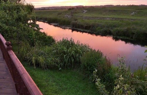 Icklesham Ski Chalet | River Fronted Self Contained Annex With Panoramic Views in a peaceful location.