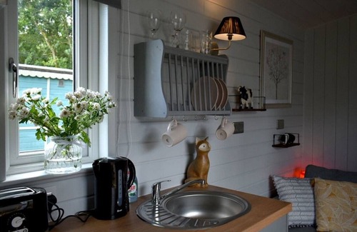 Llanfair Caereinion Cottage | River View 13 is a four berth large glamping cabin.