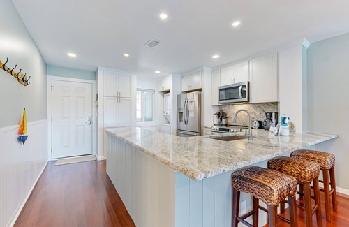 Folly Beach Condo | Riverfront condo near Folly Beach with balcony, views, outdoor pool & tennis
