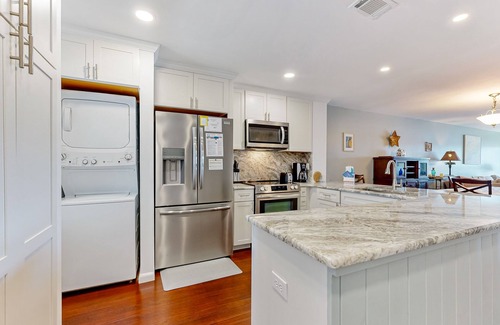 Folly Beach Condo | Riverfront condo near Folly Beach with balcony, views, outdoor pool & tennis