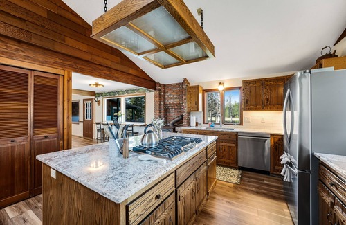 Bigfork House | Riverfront home with private dock, kayaks, 150+ ft Swan River frontage - dogs OK