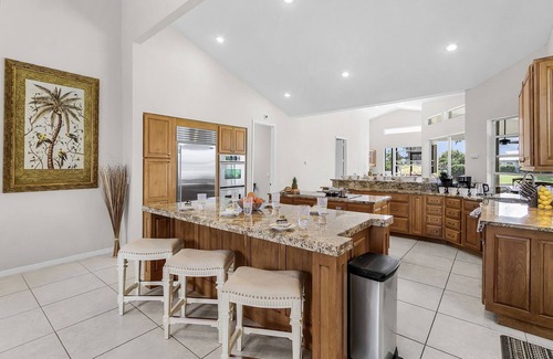 Pelican House | Riverfront Luxury with Heated Pool, Spa & Private Dock – Sunny Shores Escape