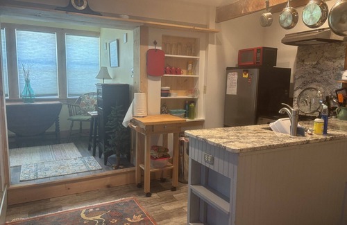 Sutton Cottage | Riverside Cottage in the heart of Historic South Sutton.