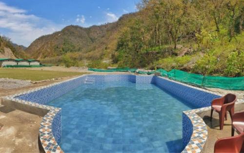 Paliyal Gaon Resort | Riverside Glamping By StayApart x Elephant Brook