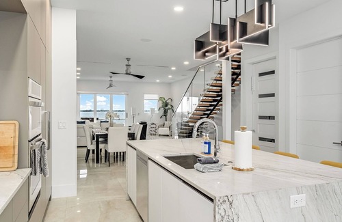Melbourne House | Riverview Oasis- Riverfront Paradise with Dock, Elevator, Private Pool & Kayaks