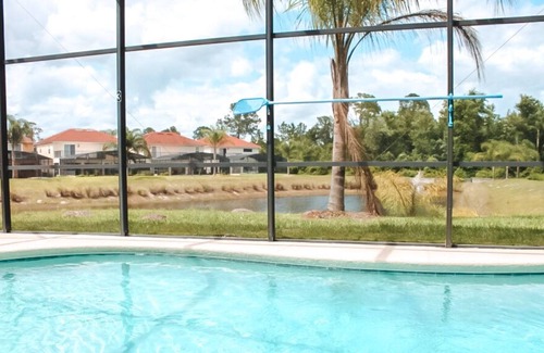 Lake Wilson Preserve House | Robins Nest at Lake Wilson Preserve | Water & Conservation Views, Second Floor Balcony, Extended Pool Deck!