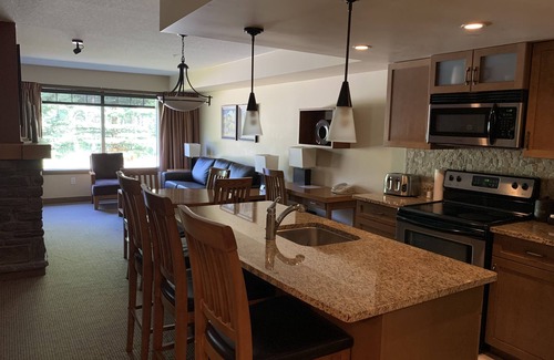 Dead Man's Flats Condo | ★Rocky Mountain Retreat and 5 Min Walk to the Bow