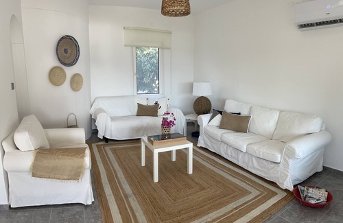 Gundogan House | Romantic hillside villa with stunning views, community beach and pool