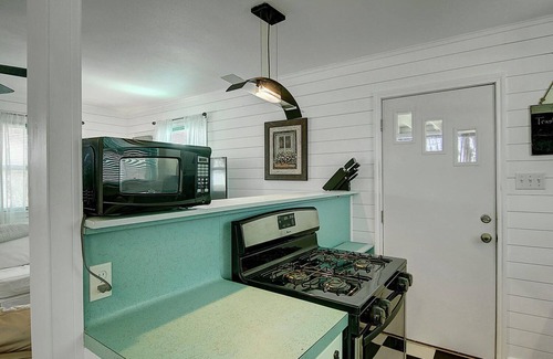 Old Town House | Romantic storybook cottage nestled in the bougainvillea of old town Port A!