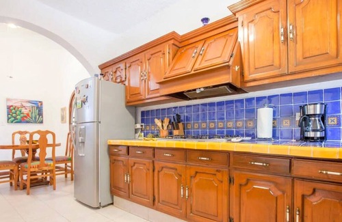 Lomas de Palmira Apartment | Rooftop Views & Sunsets, Steps to the Malecón