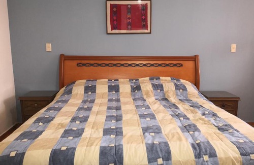 Del Cerrillo House | Room in House - Awesome King Room In City Center