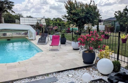 Saint-Denis-les-Ponts Bed & Breakfast | Room in villa with pool