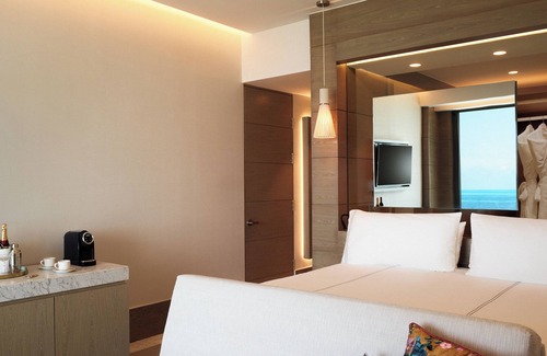 Punta Sam Hotel | Room w/Balcony facing the Sea in Tranquil Beachfront Resort w/Outdoor Pools